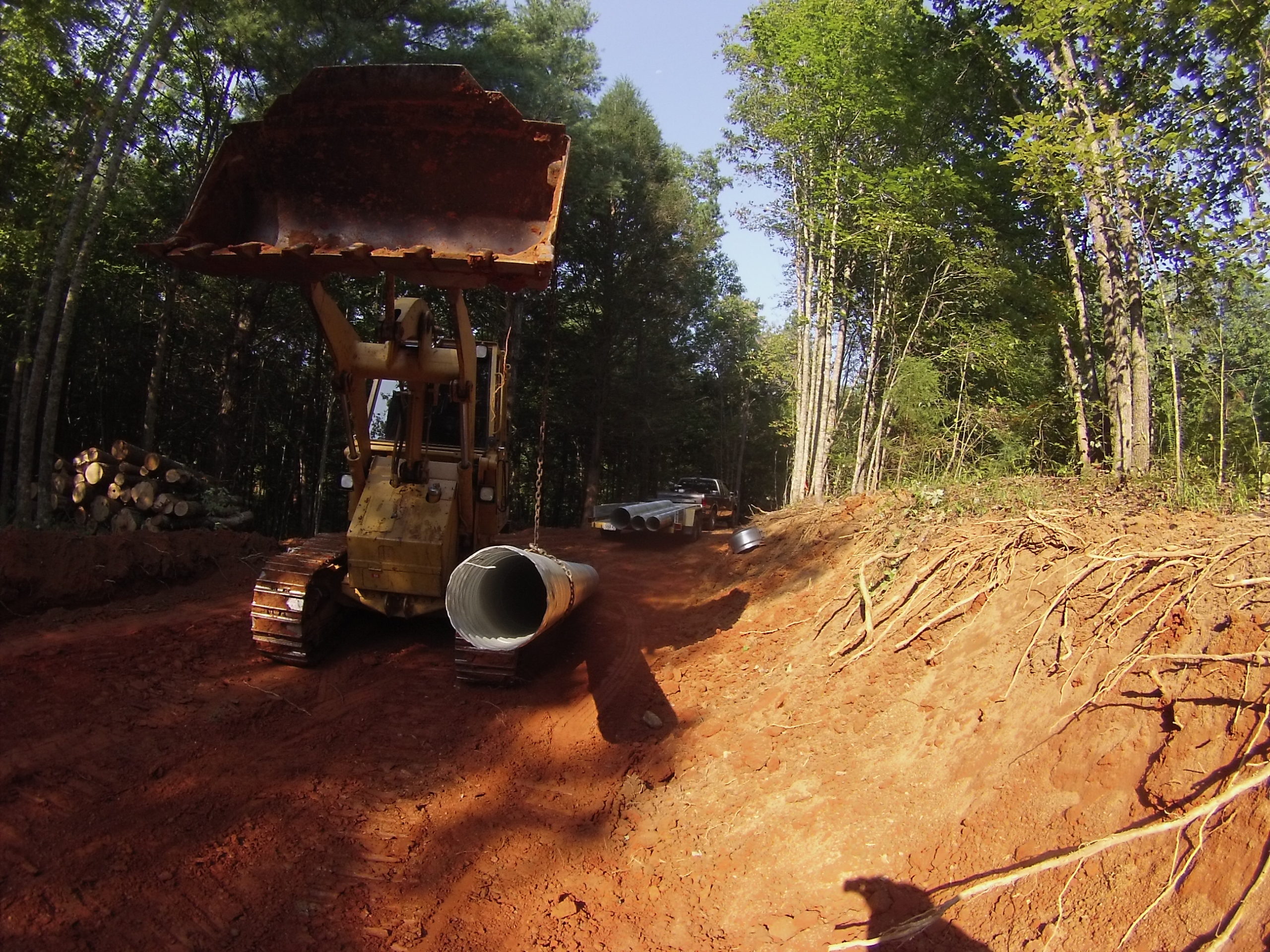 Land clearing, grading and drainage pipe